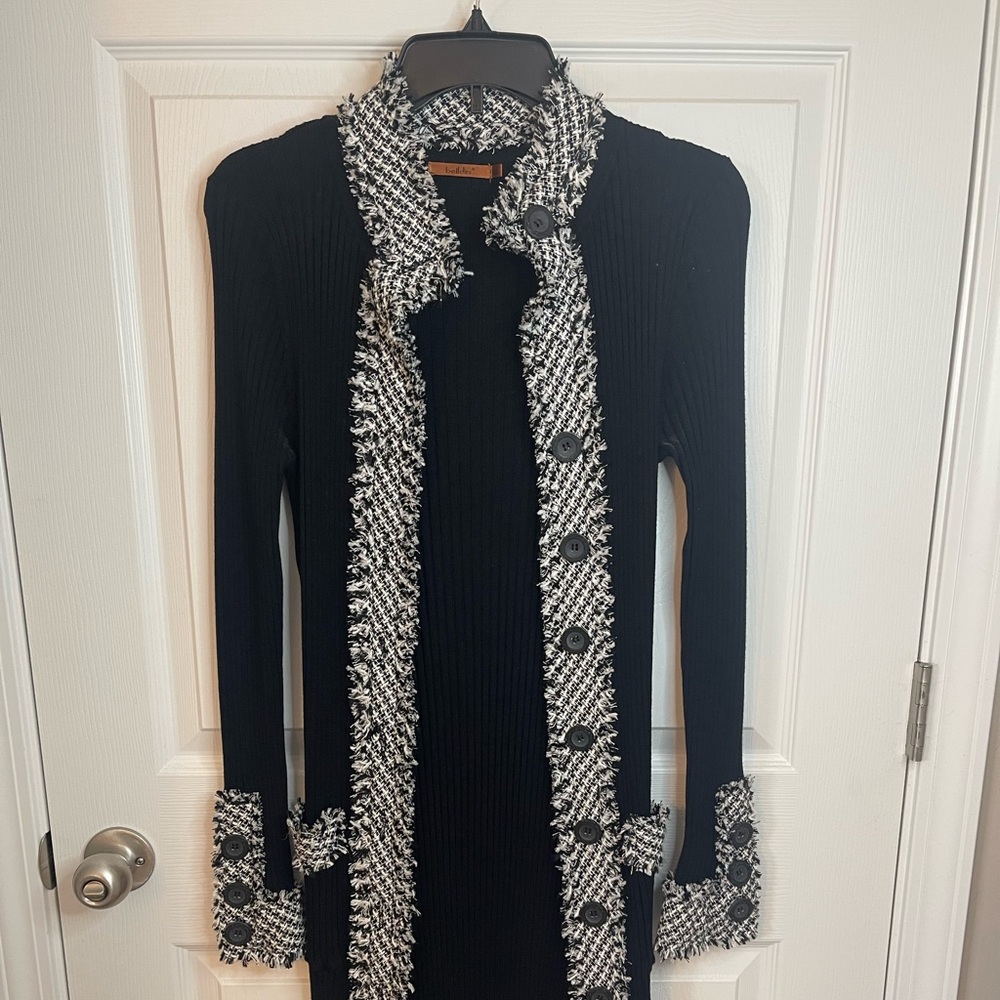 Belldini Sweater from Dillards size Medium. Intricate design, mid-thigh length.